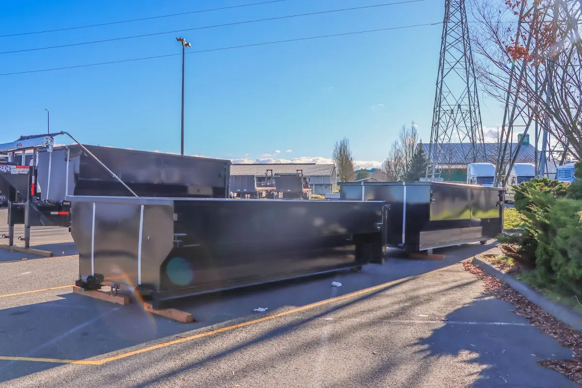 Roll-off dumpster ready for waste disposal at job site for Demolition Dumpster Rental in Keansburg